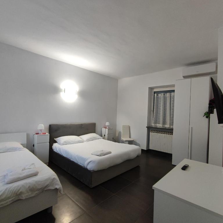 Camera Tripla con Bagno Privato Esterno - B&B Casa Lilla